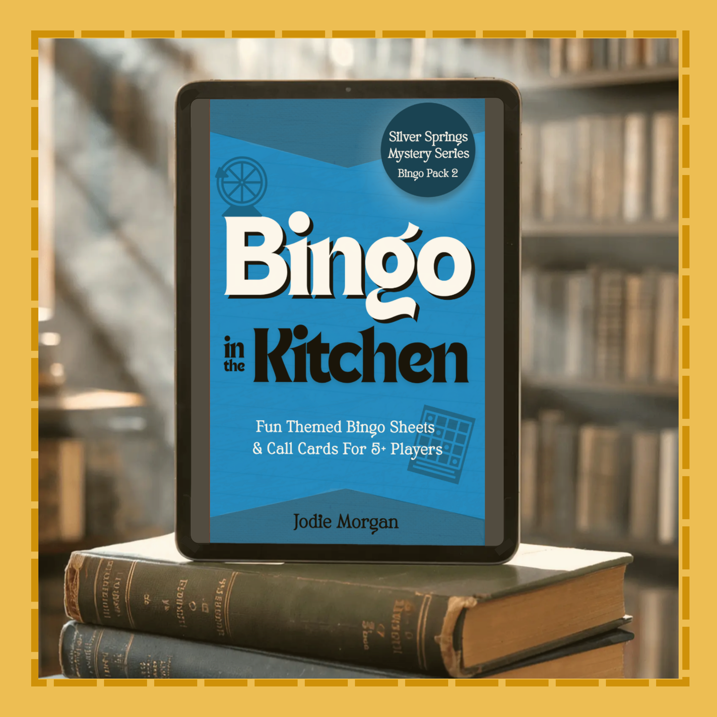 Ebook titled 'Bingo in the Kitchen' on a stack of books with a blurred bookshelf background