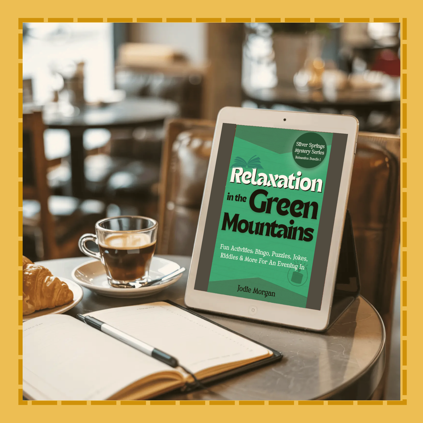 Tablet displaying a book cover titled Relaxation in the Green Mountains on a table with a cup of coffee and notebook.