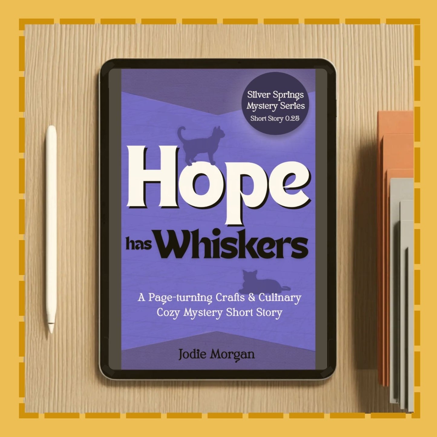 Ebook cover of 'Hope has Whiskers' on a tablet with a pen and book on a wooden surface