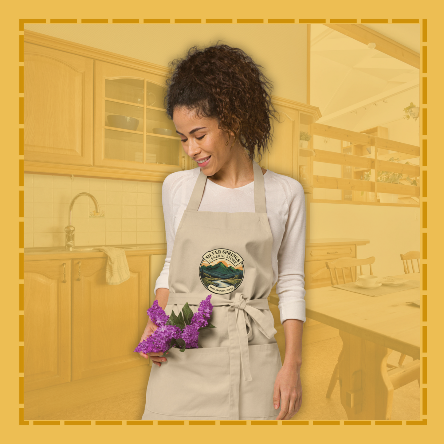 Woman wearing a branded apron in a kitchen setting