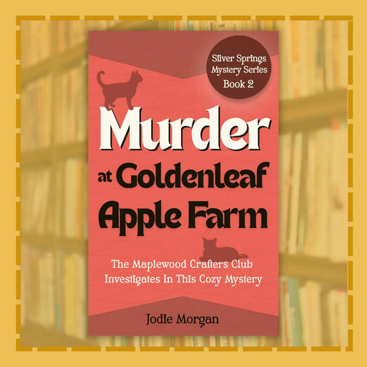 Book cover of 'Murder at Goldenleaf Apple Farm' by Jodie Morgan on a yellow background