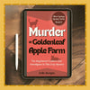 Ebook cover of 'Murder at Goldenleaf Apple Farm' on a tablet with a pen on a wooden surface.