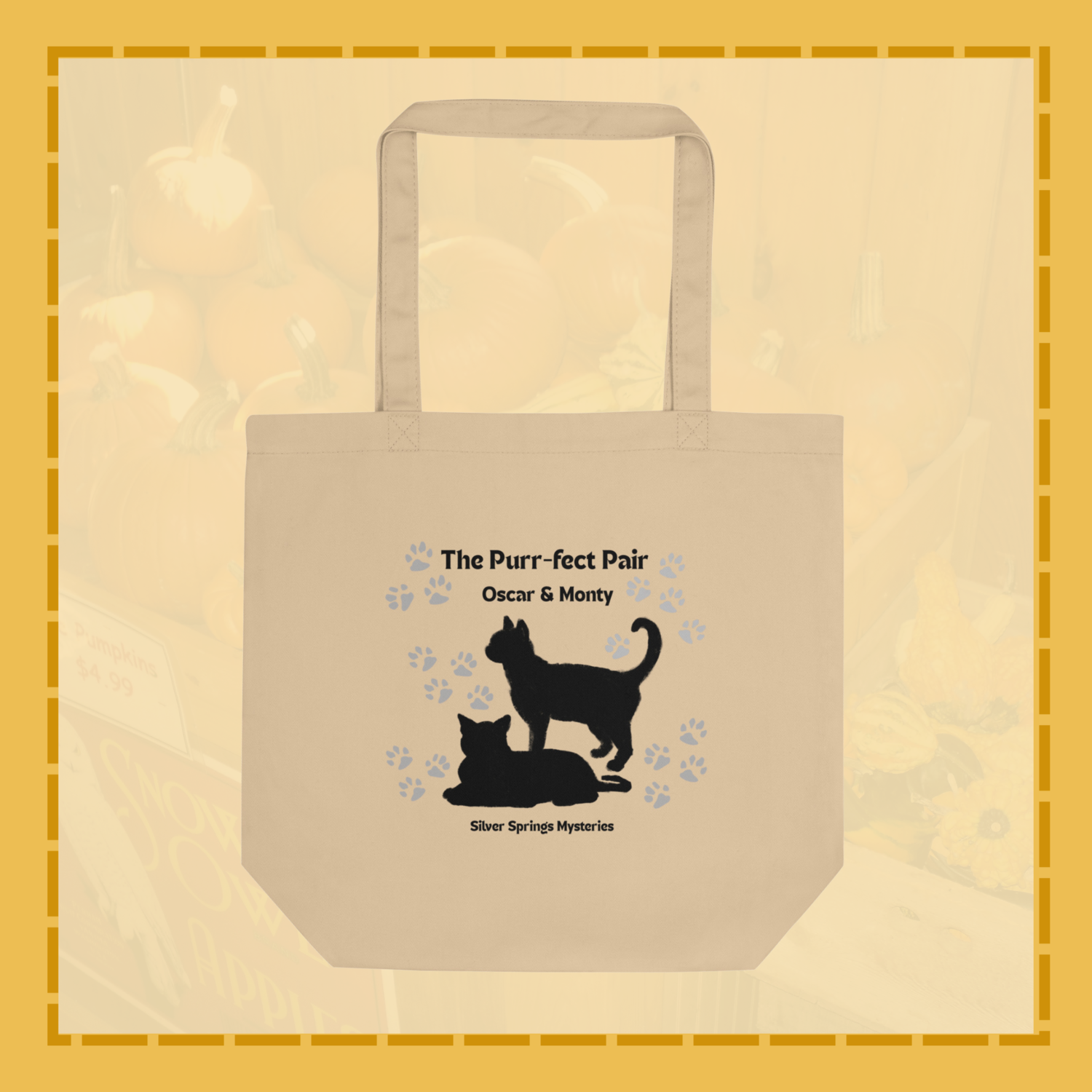 Beige tote bag with black cat design and text on a beige background