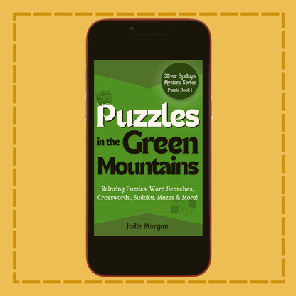 Phone displaying the cover of 'Puzzles in the Green Mountains' on a yellow background