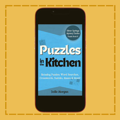 Phone displaying 'Puzzles in the Kitchen' book cover on a yellow background