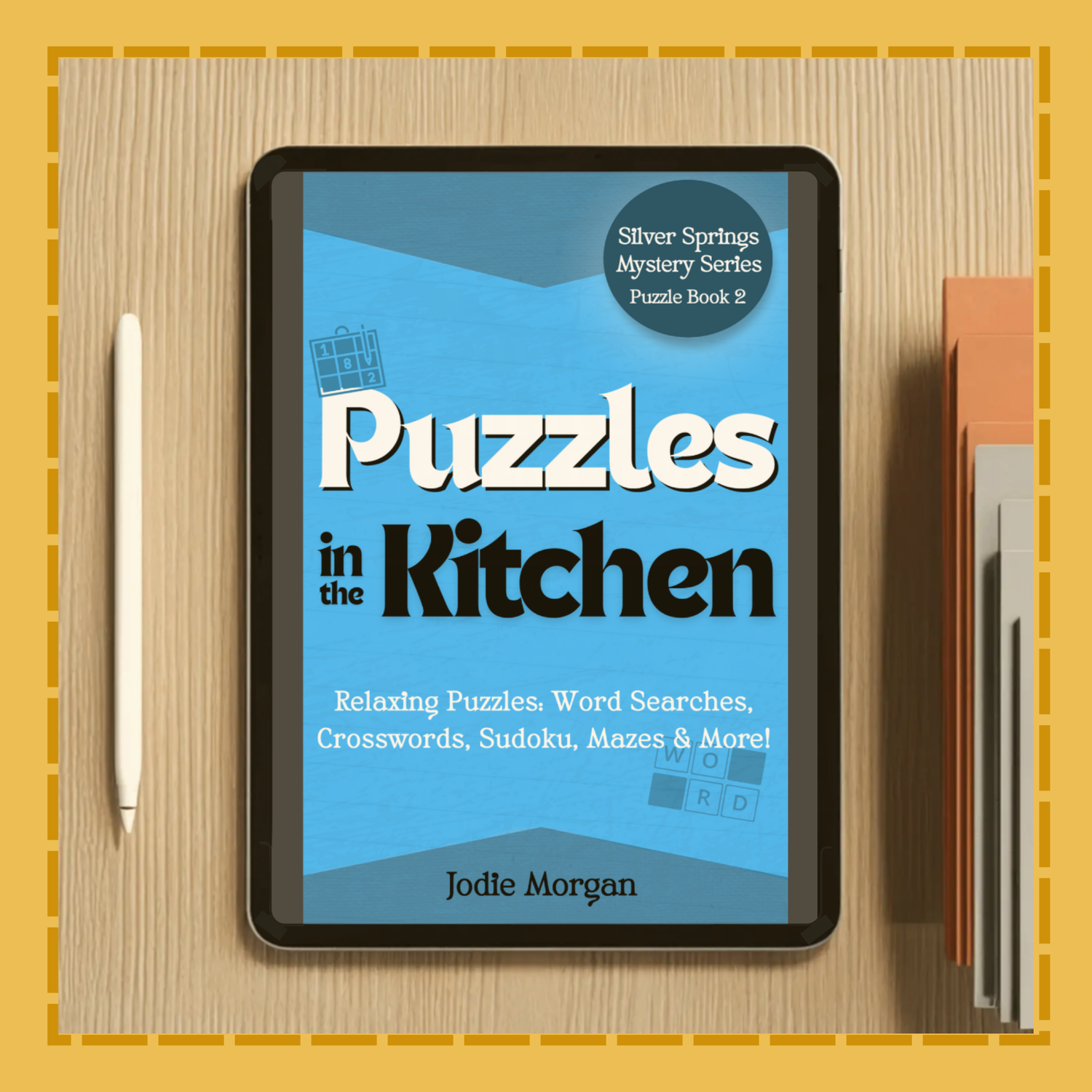 Ebook titled 'Puzzles in the Kitchen' on a digital device with a pen and book on a wooden surface.