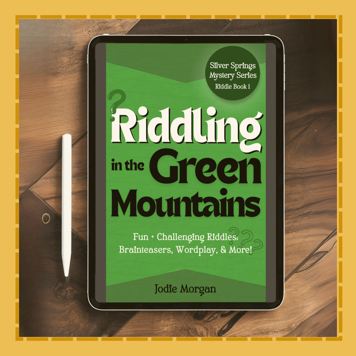 Tablet displaying the book cover of 'Riddling in the Green Mountains' on a wooden surface.