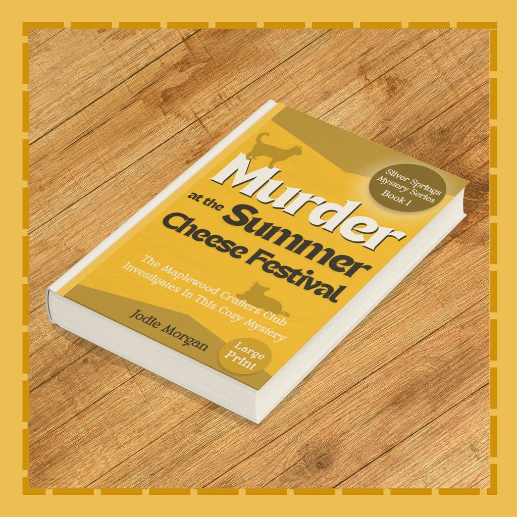Book titled 'Murder at the Summer Cheese Festival' on a wooden surface