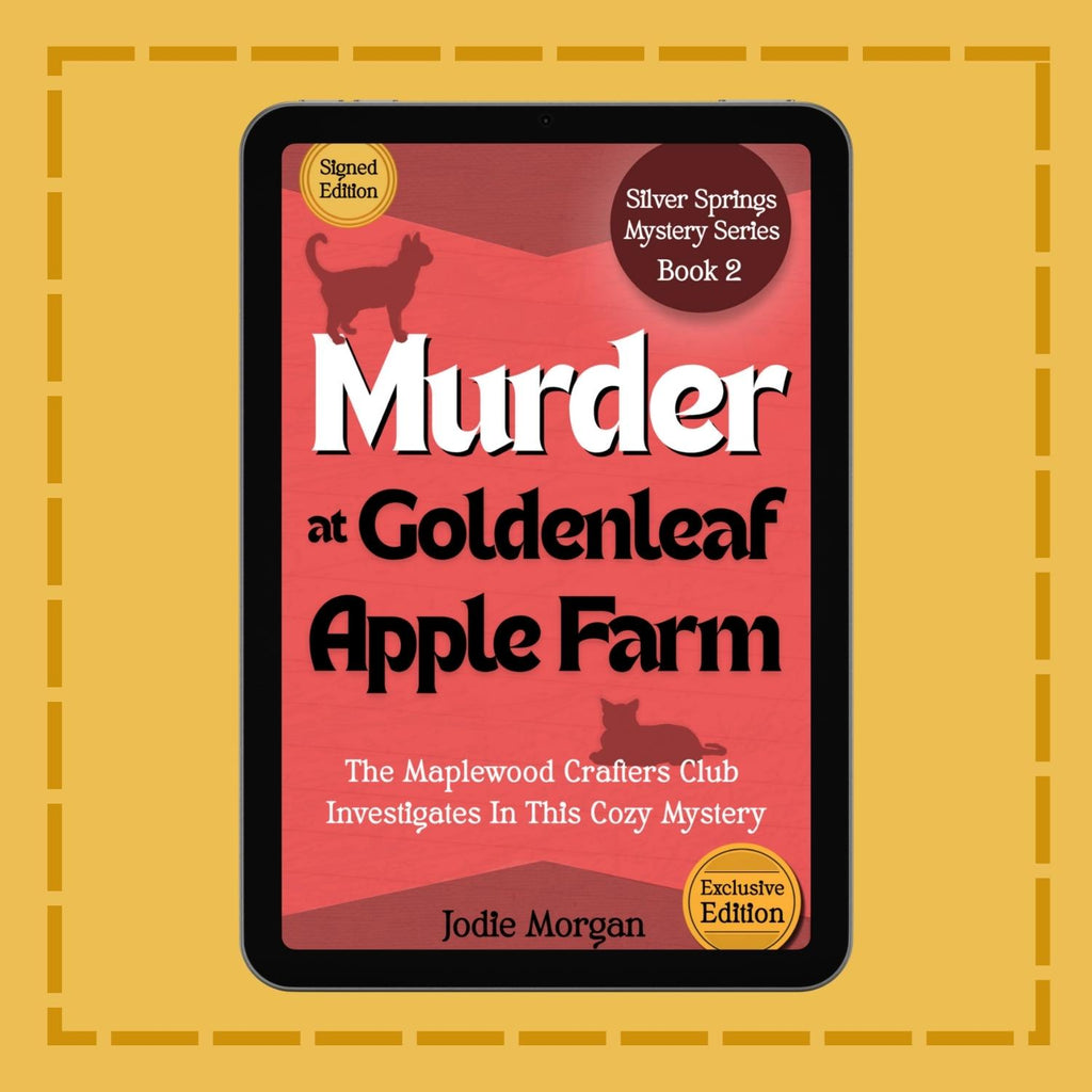 Signed Edition Of Murder At Goldenleaf Apple Farm on a tablet.