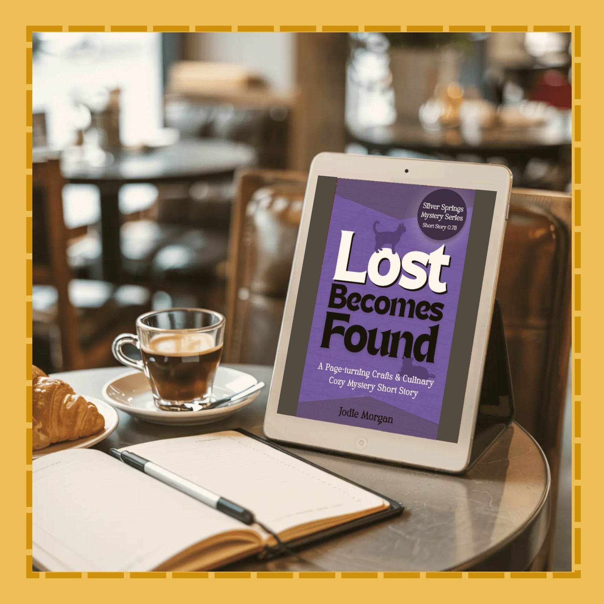 Tablet displaying 'Lost Becomes Found' on a table with a coffee and pastry in a cafe setting
