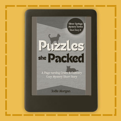 E-reader displaying a book cover titled 'Puzzles she Packed' on a yellow background