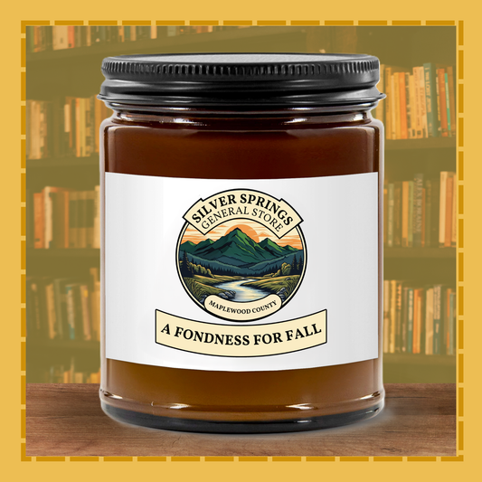 Candle jar with 'Silver Springs General Store' label in front of a bookshelf