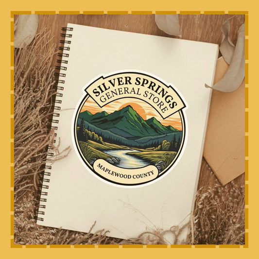 Notebook with Silver Springs General Store logo on a wooden surface